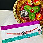 Om Rakhi with Dry Fruits And Traditional Thali
