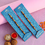 Traditional Pearl Studded Rakhis Set Of 2 With 250 Gms Soan Papdi