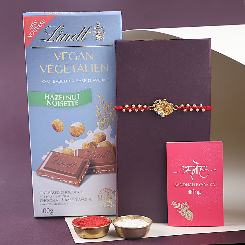 Sneh Lord Krishna Rakhi & Lindt Hazelnut Chocolate