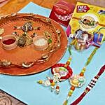 Outstand Rakhi Set Of Four Thali With Lind Lindor