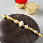Divine Golden Pearl Thread Rakhi With 3 Pcs Ferrero Rocher