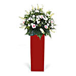 Lovely Mixed Flowers Red Stand Arrangement