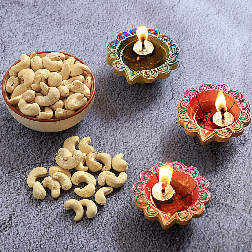 Floral Diyas With Greeting Card And Cashews