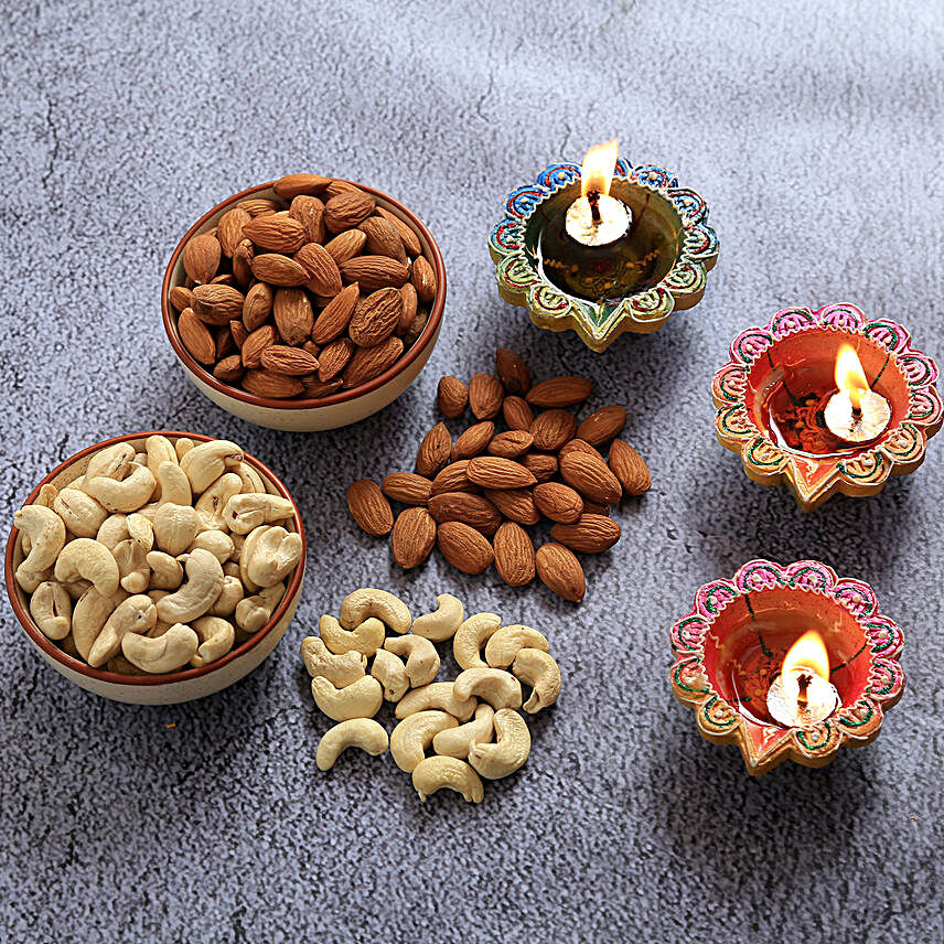 Floral Diyas With Greeting Card And Dry Fruits