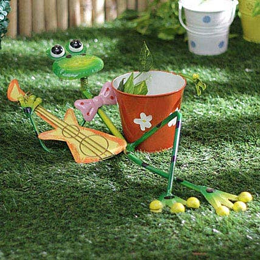 Frog lying playing guitar planter