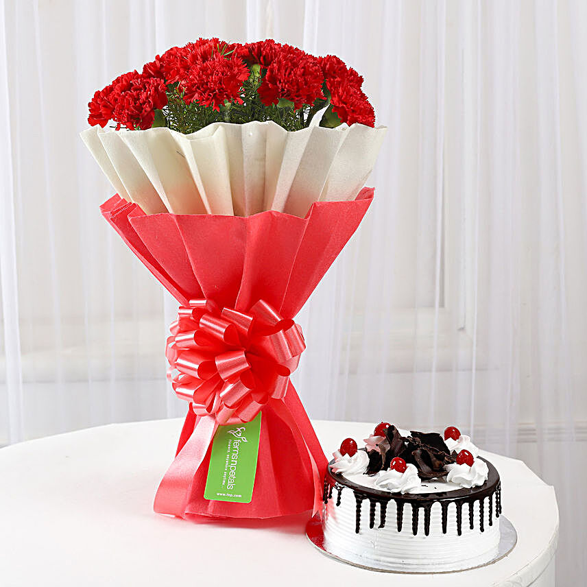 12 Red Carnations & Black Forest Cake Combo