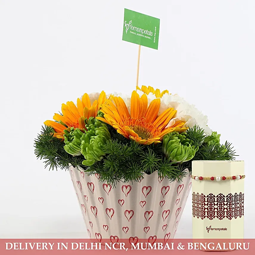Cupcake Pot Of Vibrant Flowers & Pearl Rakhi