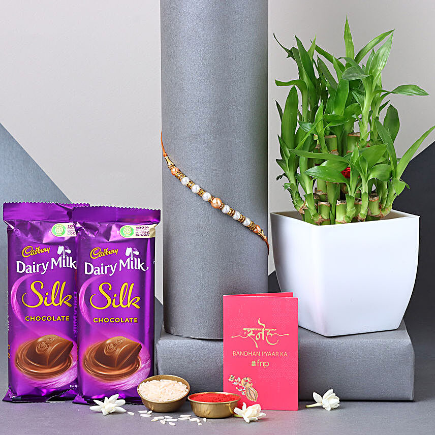 Sneh Pearl Rakhi & Lucky Bamboo With Chocolates