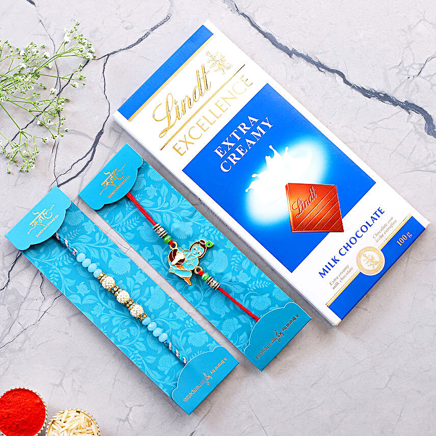 Sea Blue Pearl And Bal Krishna Rakhi Set With Lindt
