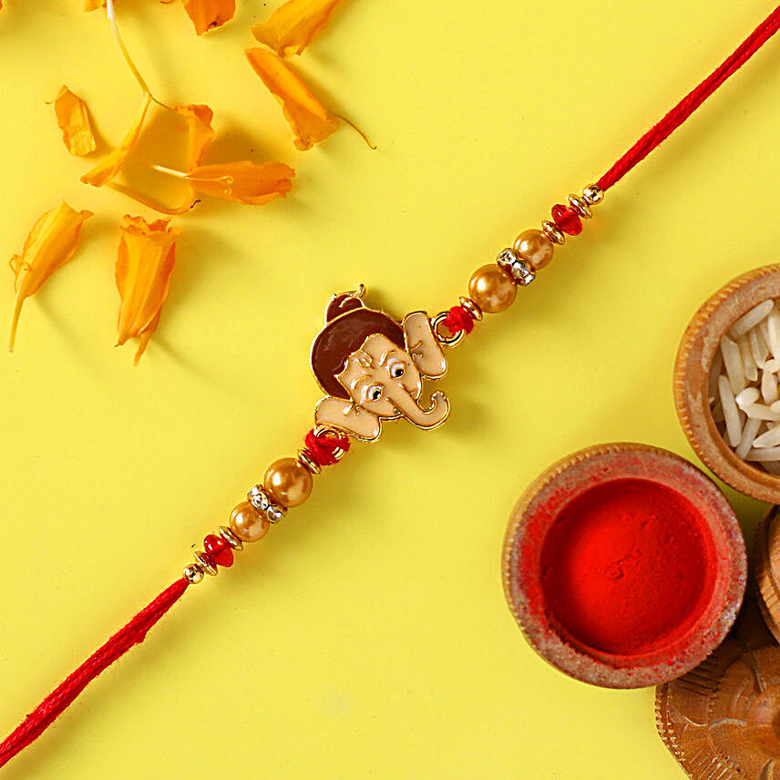 Long Trunk Bal Ganesha Pearl Rakhi For Kids With 3 Ferrero Rocher
