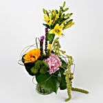 Imported Roses Lilies Liatries in Glass Vase Arrangement