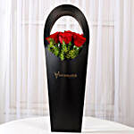 Red Roses in Stylish Black Sleeve