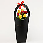 Red & Yellow Roses In FNP Sleeve Bag