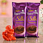 Two Dairy Milk Silk Chocolates & Orange Ganesha Idol Combo