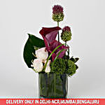 Purple Calla Lilies Pink Roses in Glass Vase