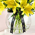 Cheerful Yellow Lilies In Fishbowl Vase