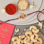 Sneh Ganesha Motif Rakhi & Cashews Combo