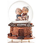 Elderly Couple Snow Globe