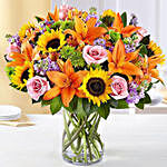 Vibrant Bunch of Flowers In Glass Vase