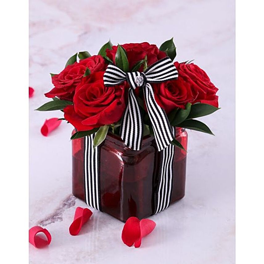 Red Roses In Red Vase