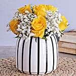 Yellow Roses In A Black And White Vase