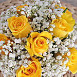 Yellow Roses In A Black And White Vase