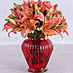 Sunset Lilies In A Red Lantern Vase
