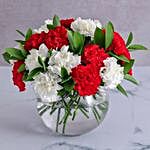 Striking Red And White Carnations In A Round Vase
