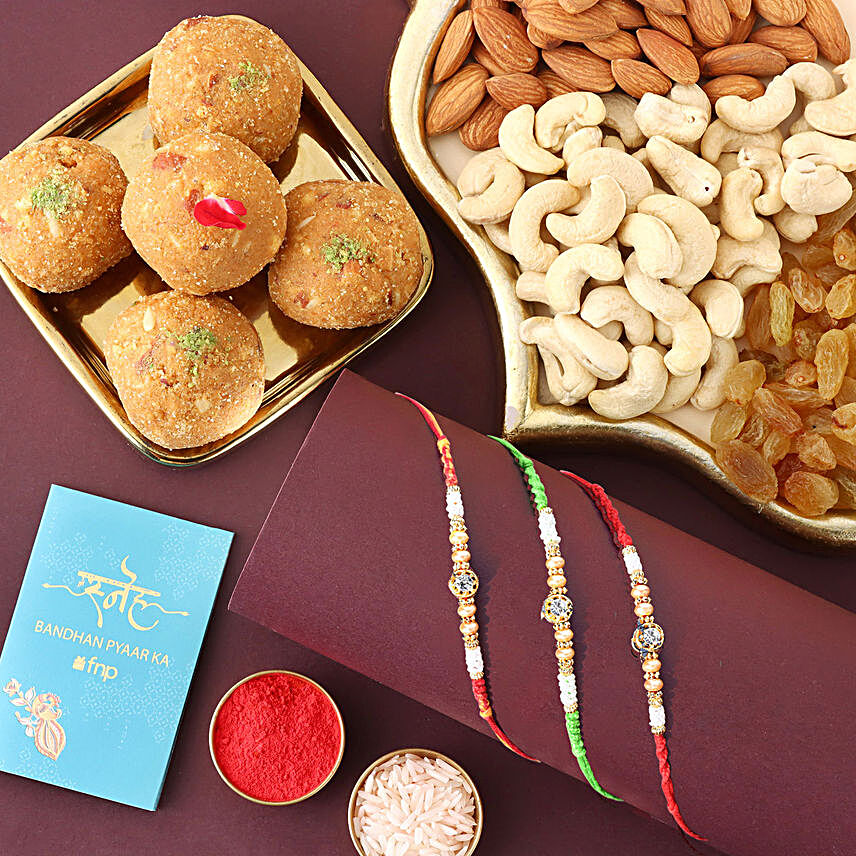 Sneh Bright Pearls Rakhi Set With Laddoo & Nuts