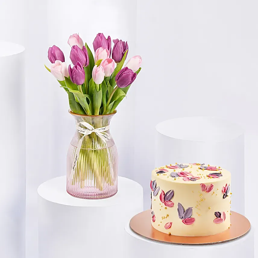 Purple and Pink Tulips in Glass Vase With Cake