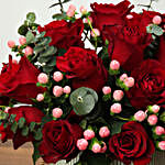Arrangement Of Red Roses and Pink Berries