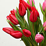 Red and Pink Tulips In Glass Vase