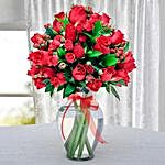 Bunch of Red Roses in Glass Vase