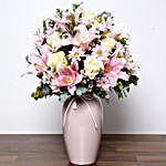 Pastel Coloured Mixed Flowers in Vase and Cake