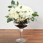 Hydrangeas In Clear Wine Glass Vase