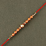 Rose Gold Pearl And Beads Rakhi with 3 Ferrero Rocher