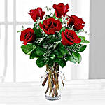 Six Red Roses In A Vase
