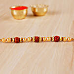 Golden Red Rudraksh Rakhi And 3 Pcs Ferrero Rocher